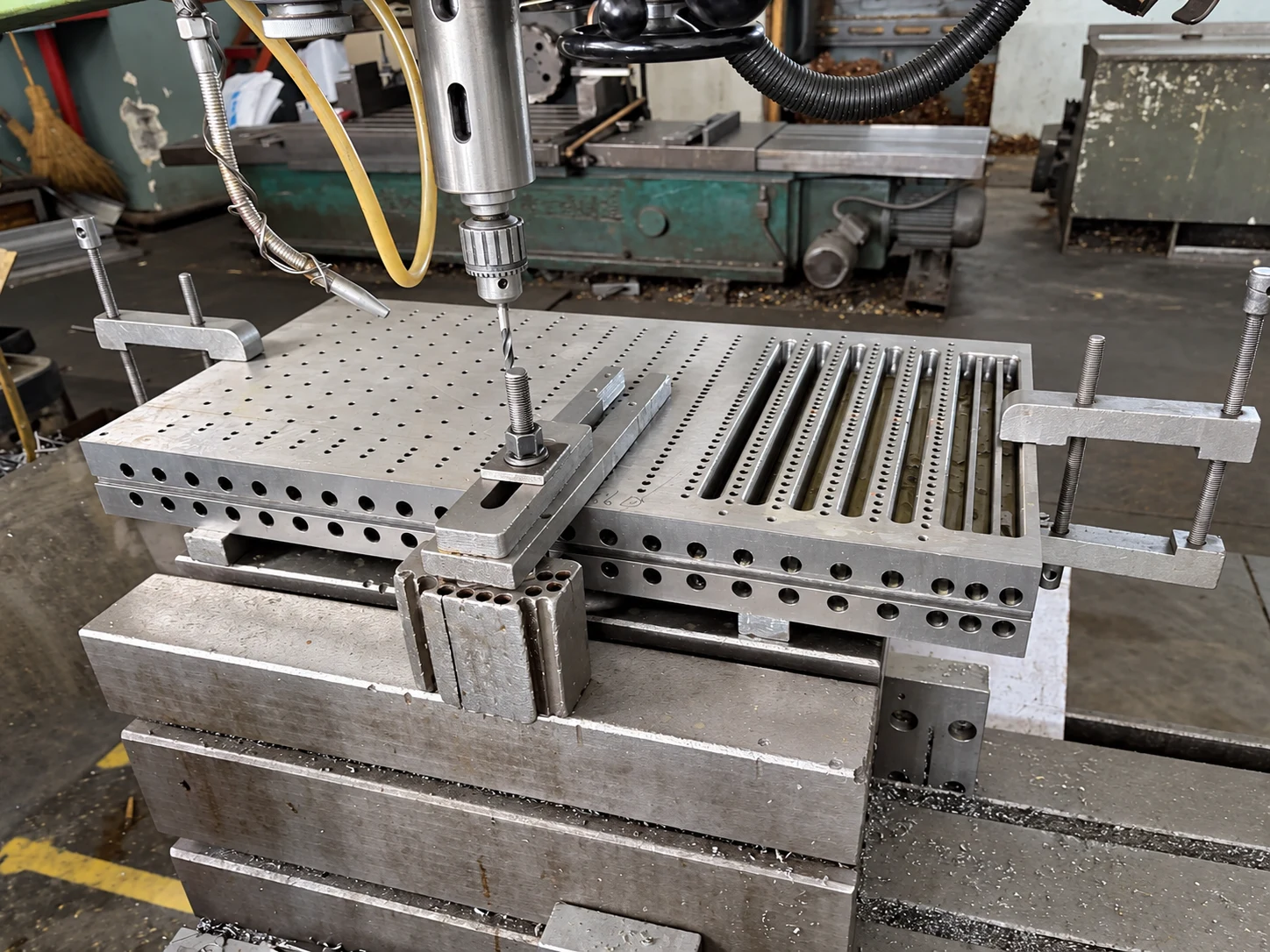 Machining mould holes